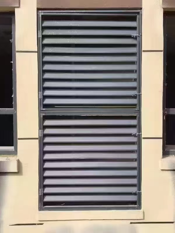 扬州市单曲弧形铝单板铝格栅百叶窗 - 方案